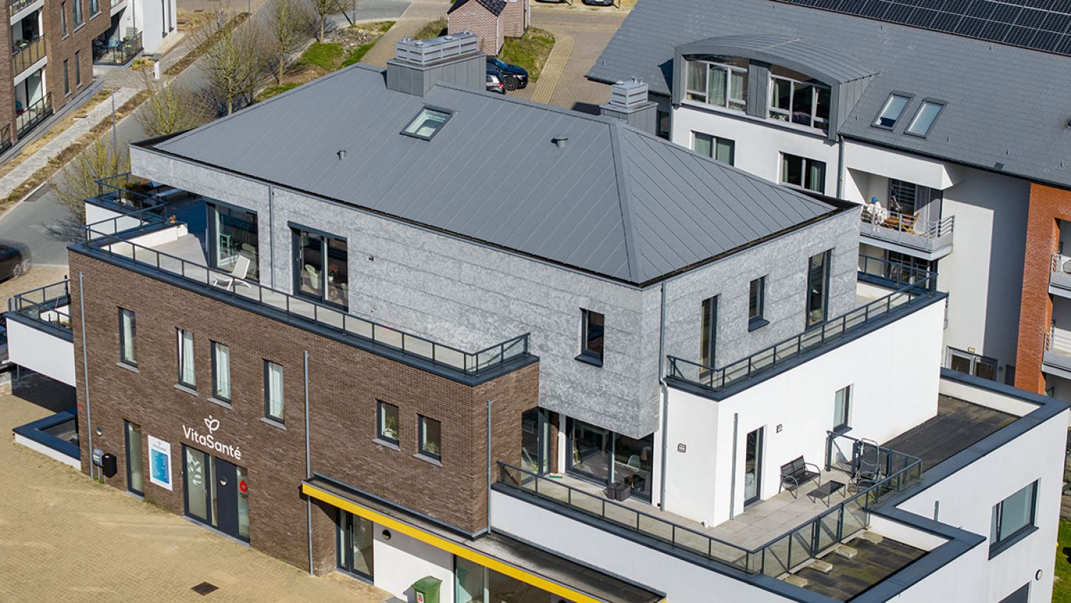 Nieuwbouwappartementen zinken dak